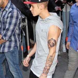 justin bieber debuts new tiger and angel tattoos u2014see the close up justin bieber debuts new tiger and angel tattoos u2014see the close up
