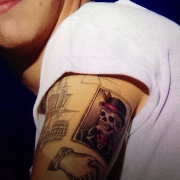 Harry Styles Debuts New Tattoo Of A Skull On His Arm—see The Pic E News