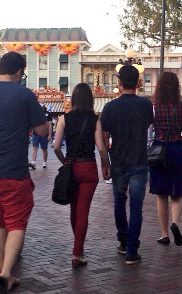 Zac Efron & Lily Collins Holding Hands at Disneyland—See ...