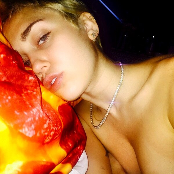 Miley Cyrus Takes A Topless Selfie Because She S Bored Why Else —see The Pics E News