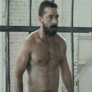 Watch Shirtless Shia LaBeouf Get Into a Weird Cage Fight During Sia's