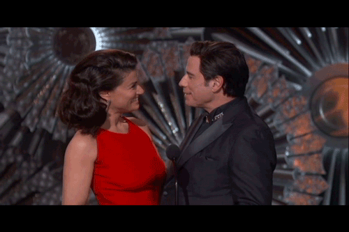 By Reaction To John Travolta Grabbing Idina Menzels Face At 
