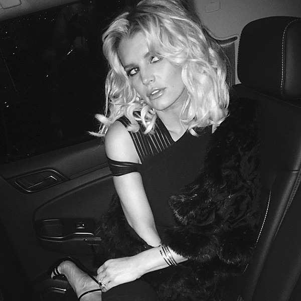 Jessica Simpson Flaunts Cleavage and Big Boots as She ...