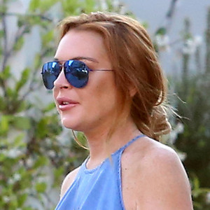 Lindsay Lohan Goes Braless and Flashes Side Boob in Monaco 