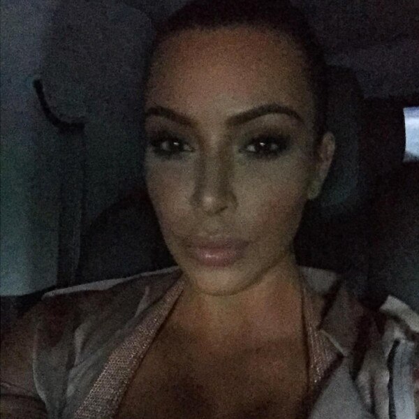 Kim Kardashian Busts Out More Cleavage Photos After Reaching 45 Million