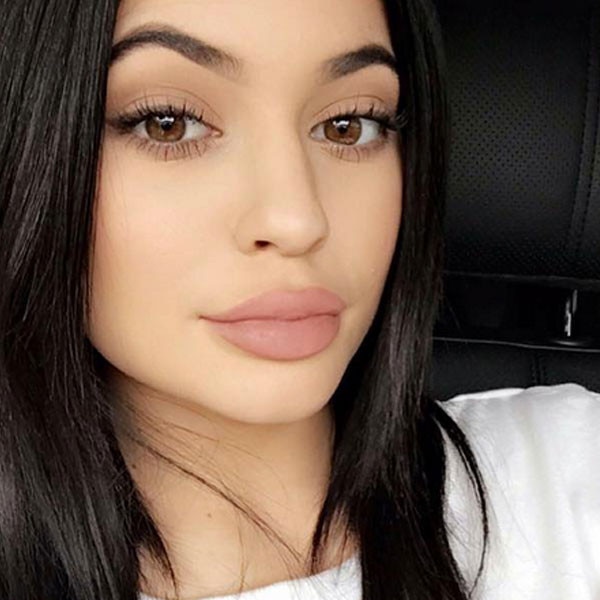 kylie jenner lips chimpanzee meme