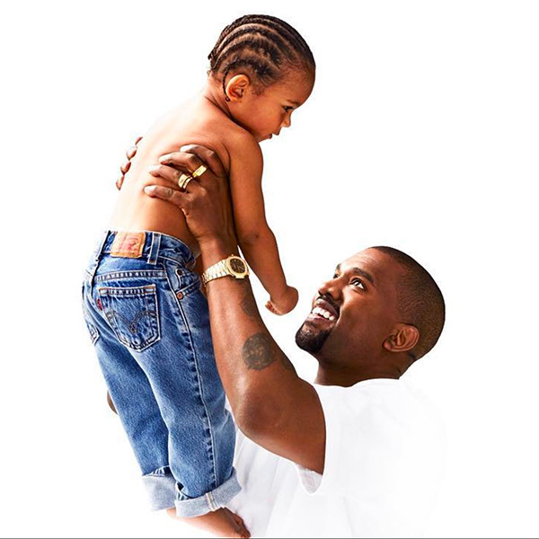 Kanye West Is a Doting Dad to Little Saint in Day 22 of Kardashian Christmas Card