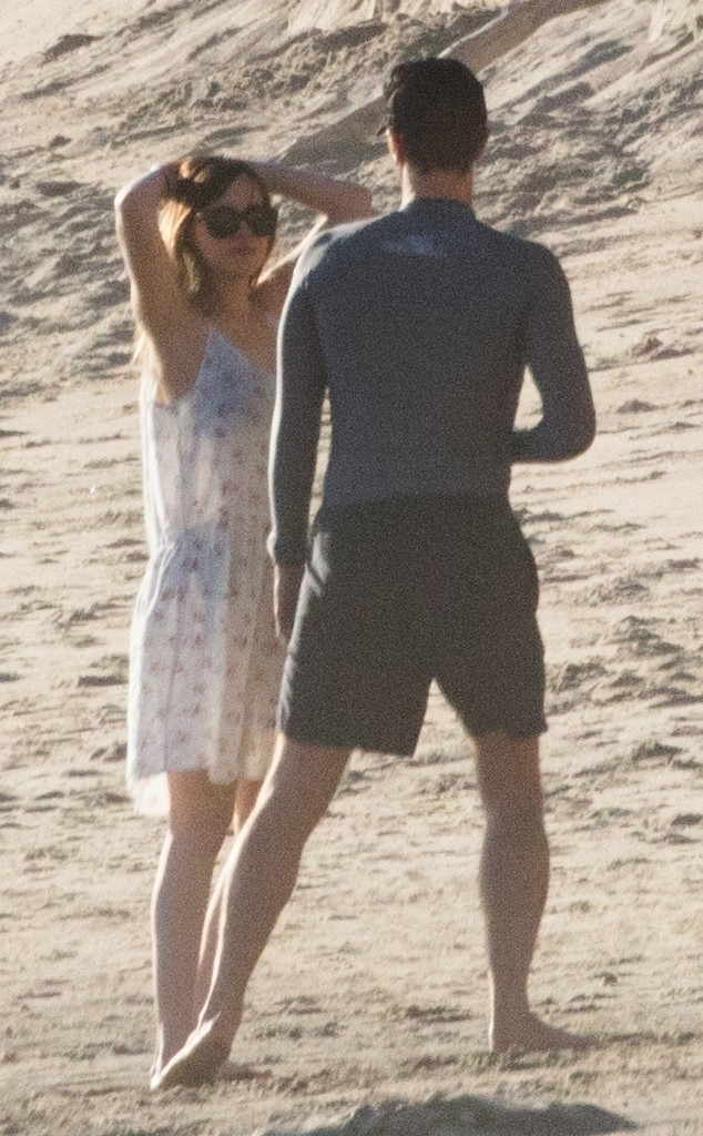 Chris Martin And Dakota Johnson Take Their Romance To The Beach E News 