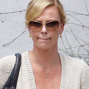 Charlize's Watch Suit Double-Times It to Trial | E! News