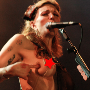 Cover Your Eye Holes! Courtney Love Takes Off Her Top in Brazil - E! Online