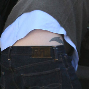 Guess Which Hollywood A-Lister Is Strutting This Dolphin Tattoo?, image size:1200x1200