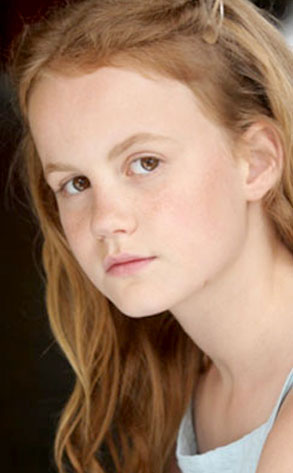 Mackenzie Lintz District 8 Tribute from The Hunger Games Meet the