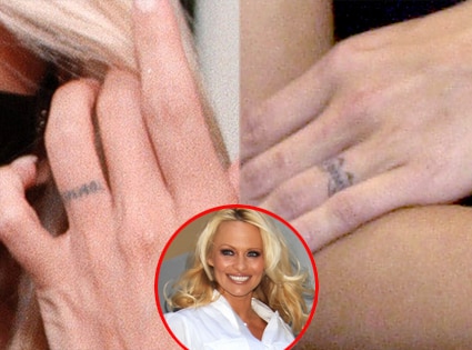 Pamela Andersons barbed wire tattoo is nearly invisible after laser removal  surgery  Daily Mail Online