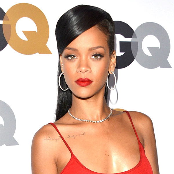 Rihanna Gives - Rihanna Keeps Clothes On, Stuns at GQ party - E! Online