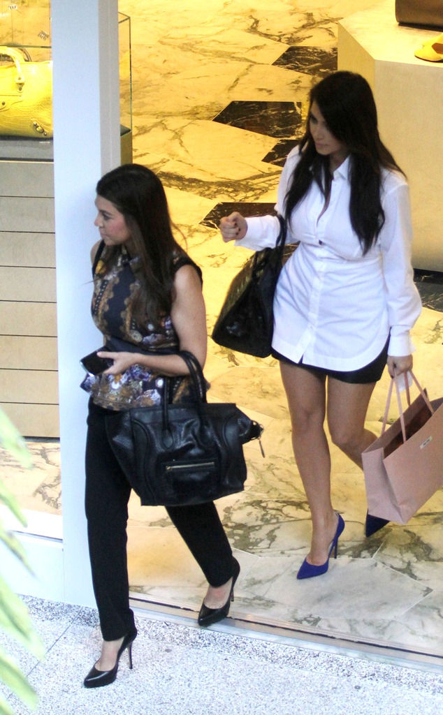 Kim Kardashian,Courtney Krdashian - Shopping in Miami