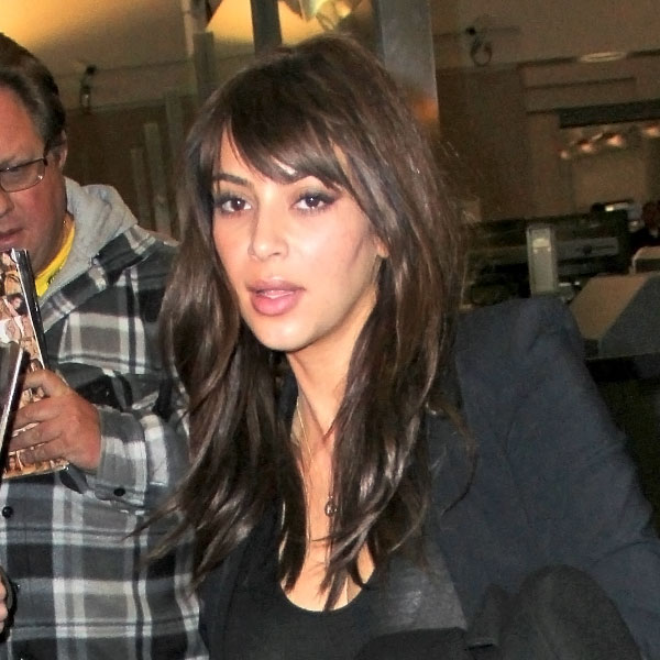 kim kardashian side swept bangs