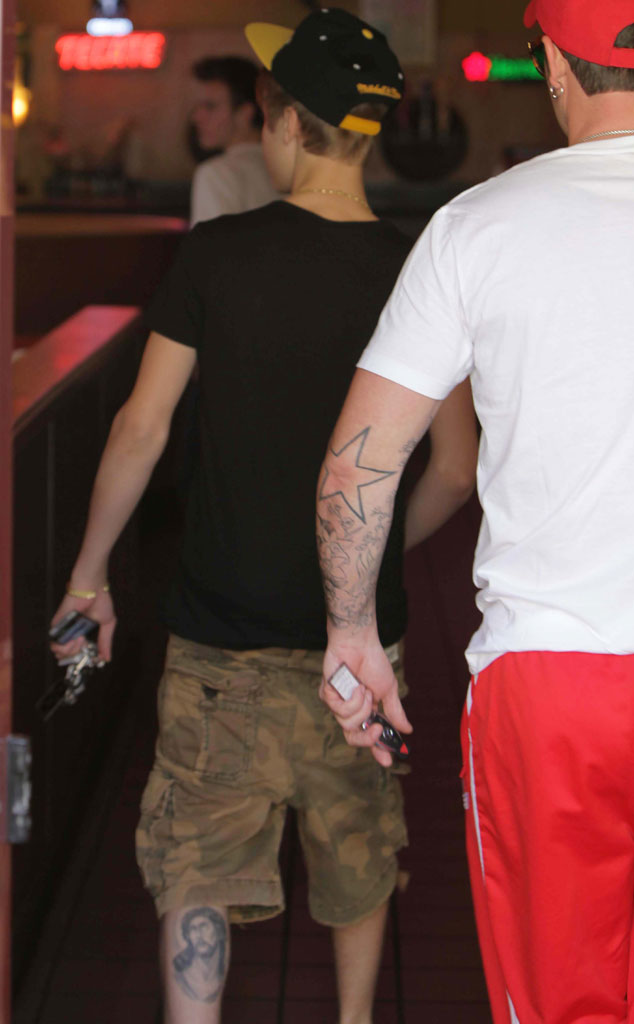 2 Justin Bieber’s Leg Jesus From Top 10 Celebrity Tattoos Of 2012 E News