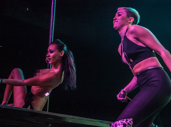 Miley Cyrus Rocks The Stage With Topless Dancer E News