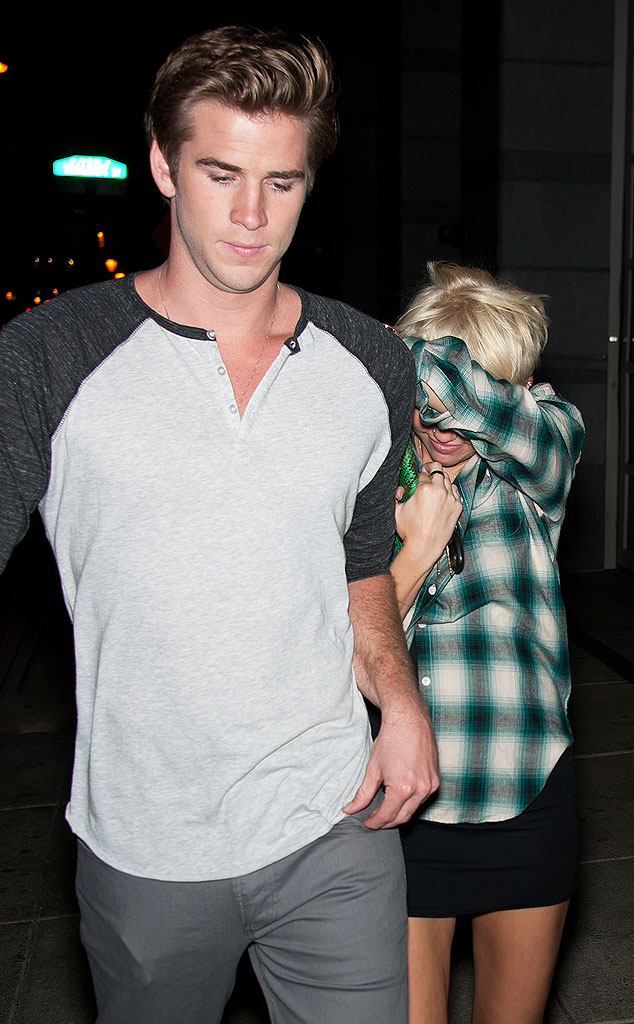 Photo Shy? from Miley Cyrus & Liam Hemsworth: Romance in Pictures | E! News