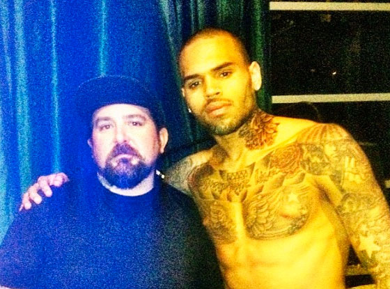 Chris Brown denies his new tattoo depicts a beaten Rihanna | Chris Brown |  The Guardian