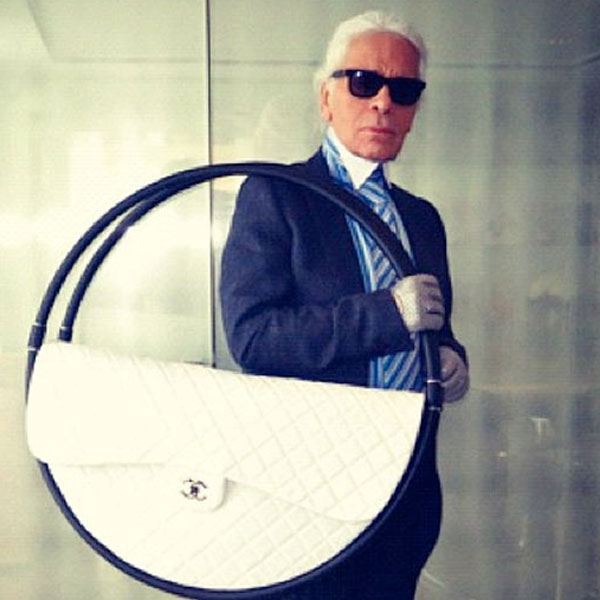 Karl Lagerfeld Confuses a Hula-Hoop for a Bag at Chanel's Paris Fashion Week  Show