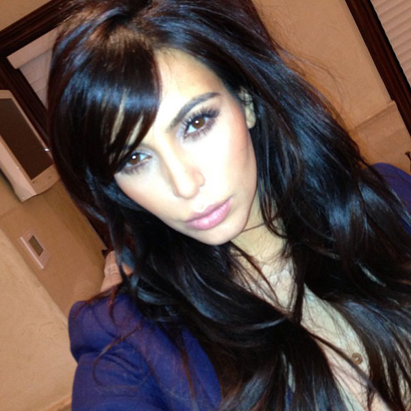 kim kardashian side swept bangs