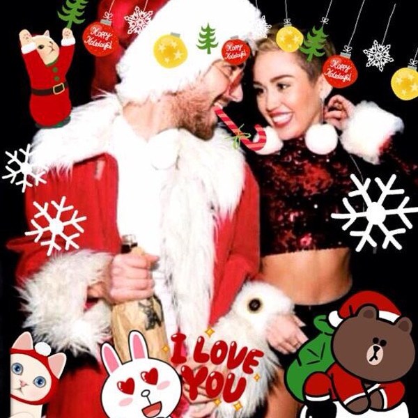 Miley Cyrus Rings In The Holidays By Freeing Her Nipples Hangs With Slutty Santas And More Cats 0538
