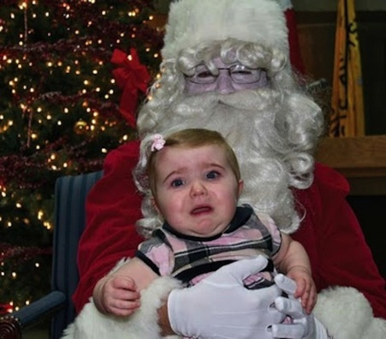 Dead Santa from Ye Ole Awkward Santa's Lap Photos | E! News