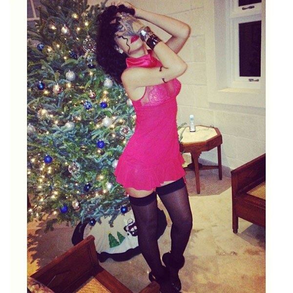 Rihanna Poses With a Christmas Tree in Lingerie