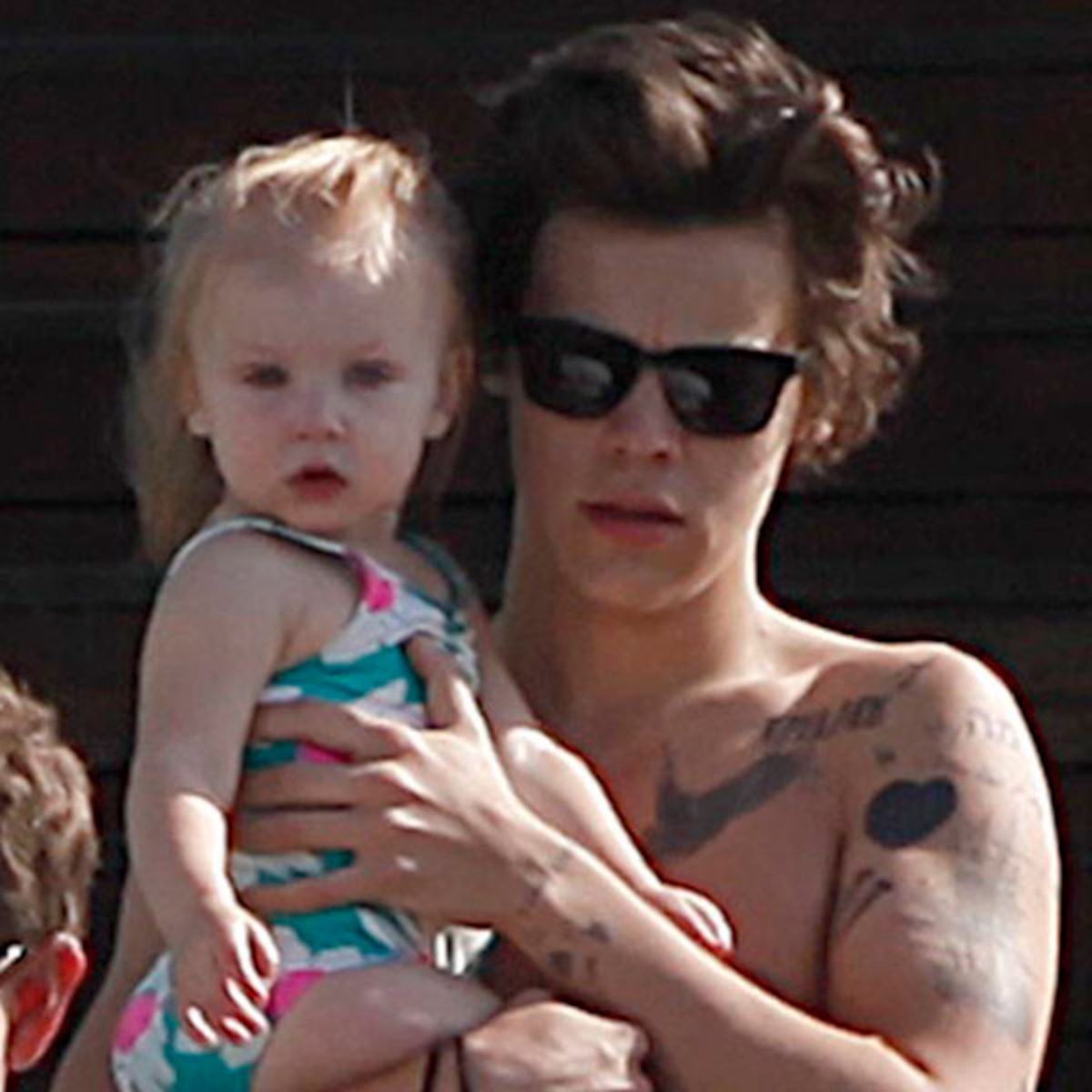 Harry Styles Goes Shirtless Holds A Baby E Online Harry Styles Goes Shirtless Holds A Baby E Online