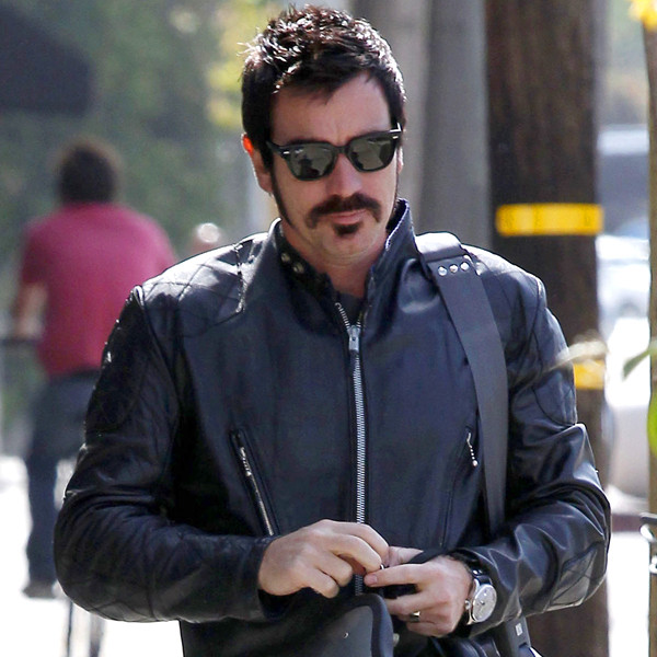 Ewan McGregor Channels Justin Theroux With Dark Hair Motorcycle Getup 