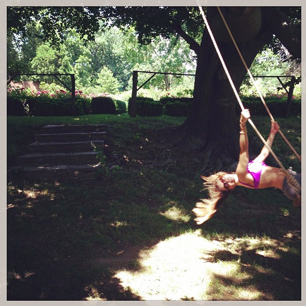 underboob))) (((a swing hanging from the tree))) (((the gir