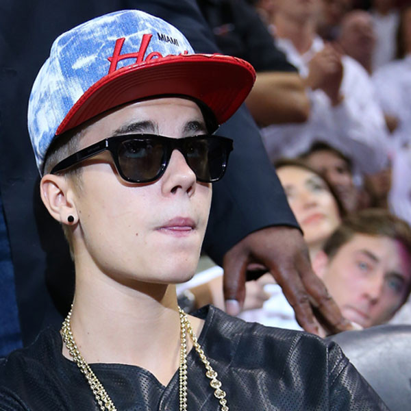 Justin Bieber Wears Leather, Gold Chains to Miami Heat Game, Teases New