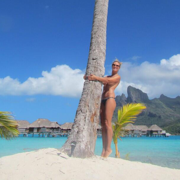 See Heidi Klum Goes Topless on Vacation!