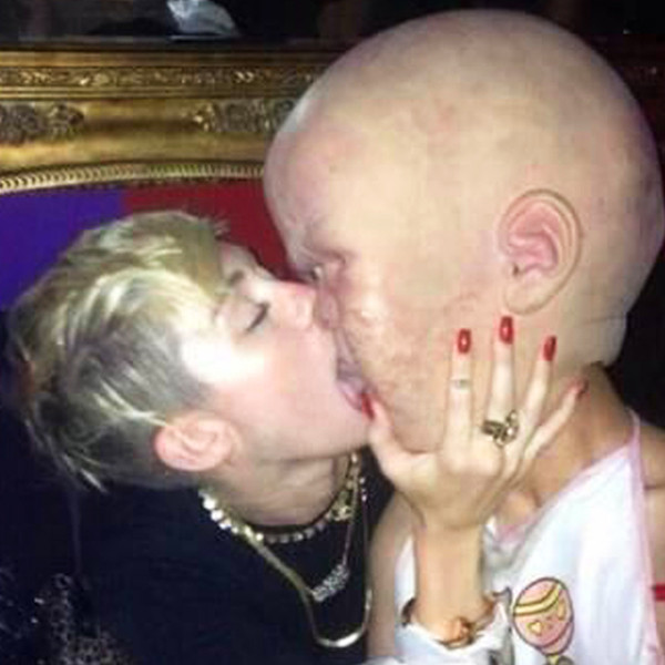 Miley Makes Out With Giant Man Baby See Photo E Online