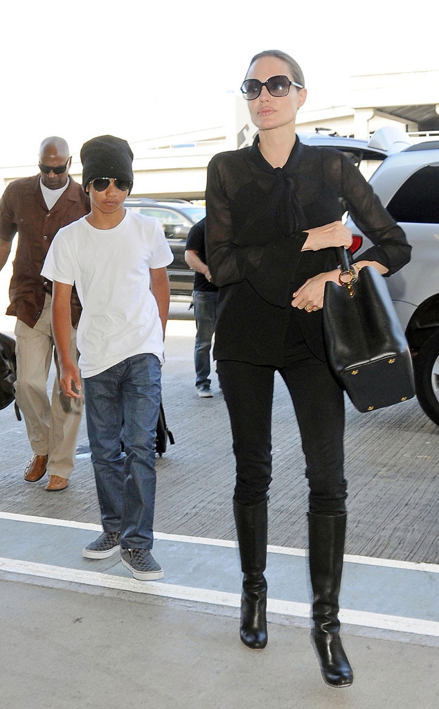 Angelina Jolie and Son Maddox Touch Down at LAX