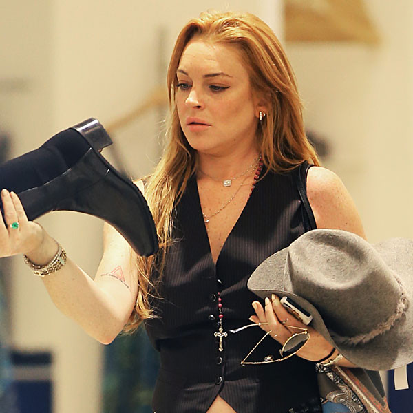 Lindsay Lohan's in Louis Vuitton Boots That Are Giving Us Shoe Envy –  Footwear News