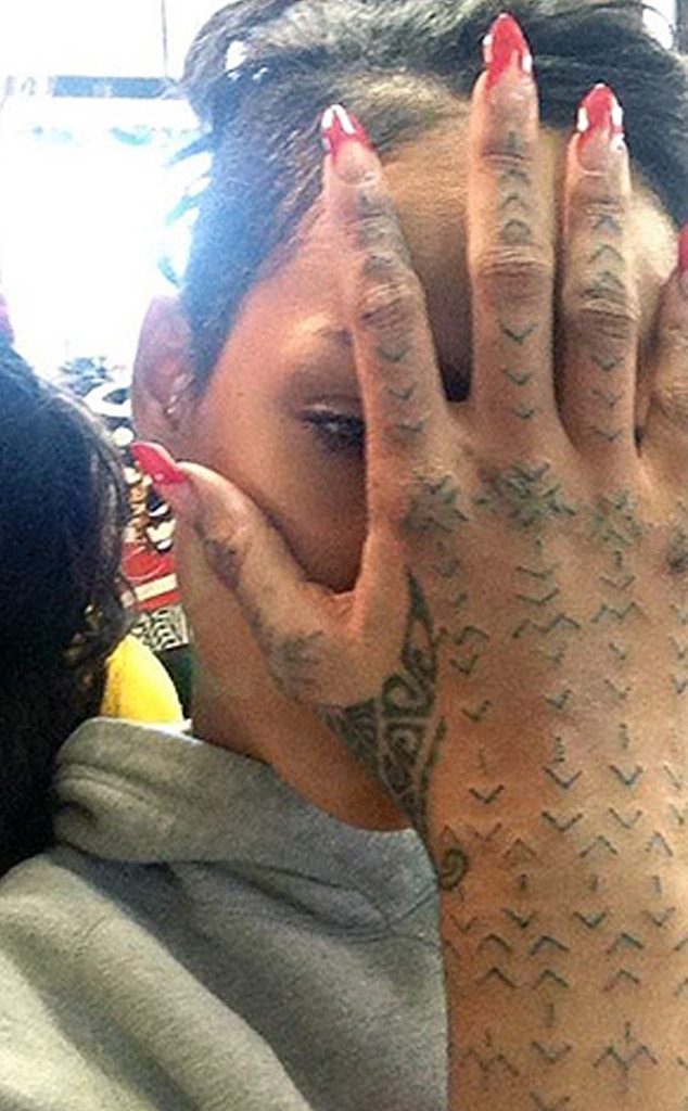 RiRi Gets Painful Tattoo With a Mallet & Chisel! - E! Online