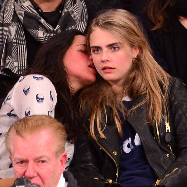 Michelle Rodriguez & Cara Delevingne Share a Sloppy Kiss at NBA Game