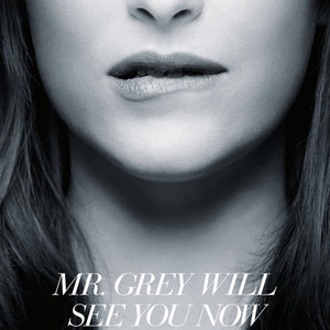 Dakota Johnson Bites Her Lip In Seductive New Fifty Shades Of Grey
