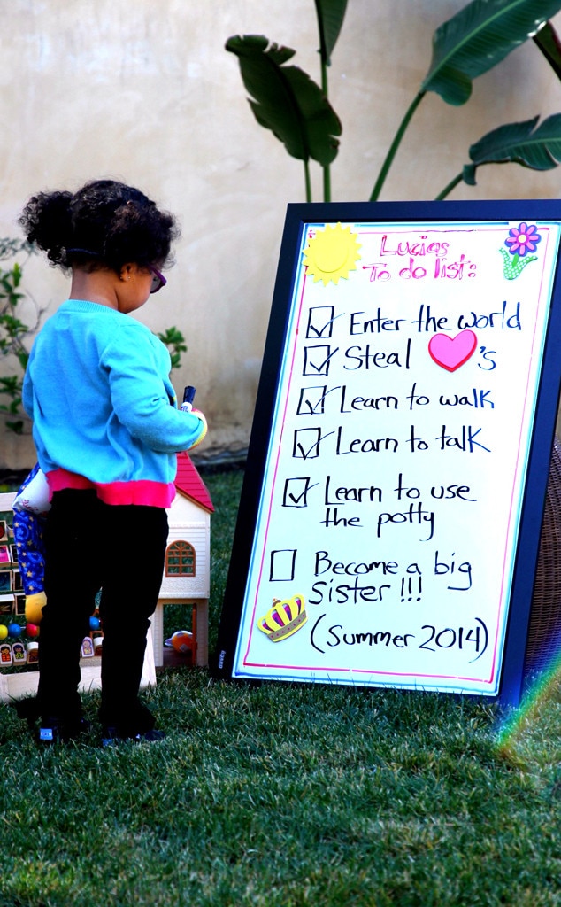 In March 2014, the lovely couple Eric Benet and his wife Manuel Testolini confirmed the news about their third child with a picture of Lucia standing in front of a "to do" list