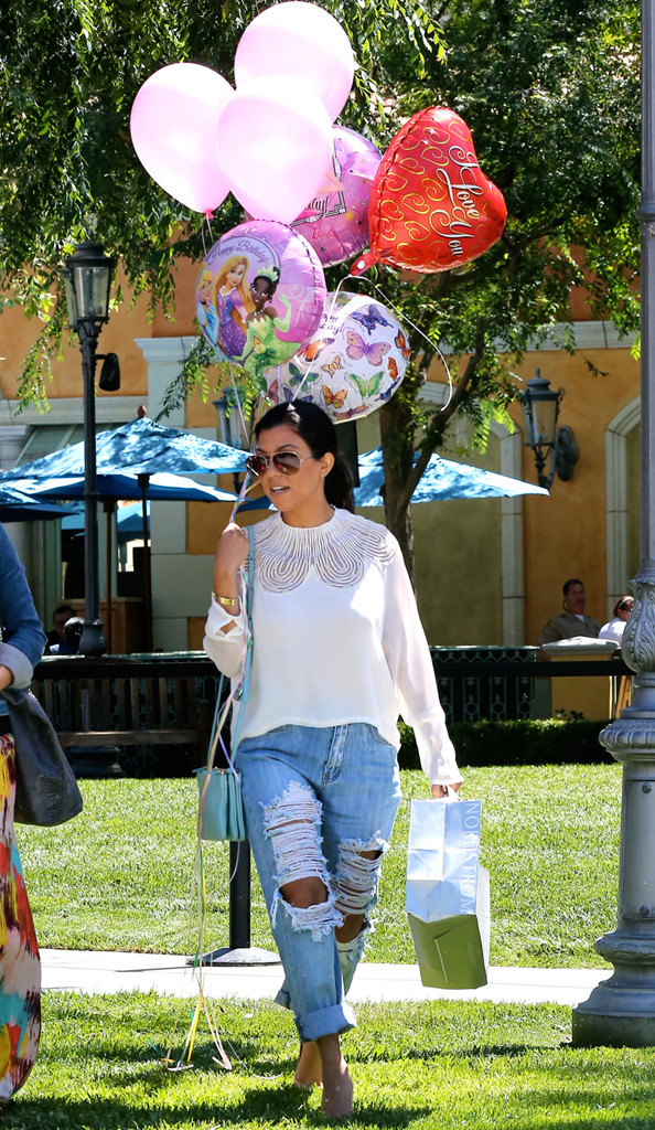 Kourtney Kardashian Wears Tattered Jeans, Totes Big Bunch ...
