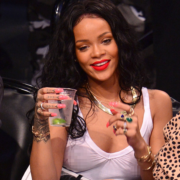 Rihanna Leaves Her Bra at Home, Checks Out Basketball Game Courtside