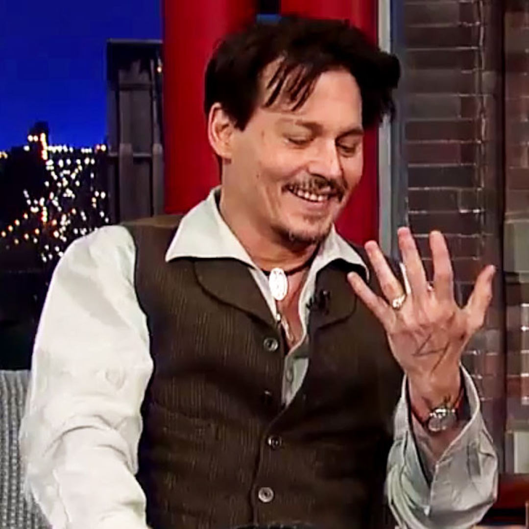 Why Johnny Depp Is Wearing Amber Heard S Engagement Ring E Online