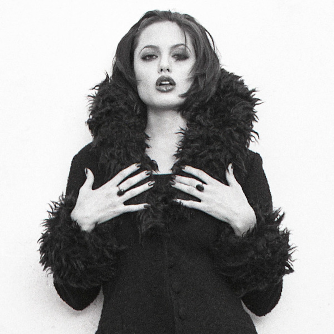 Angelina Jolie Pouts at 20 in Flashback Photo Shoot - E! Online Angelina Jolie Pouts at 20 in Flashback Photo Shoot - E! Online