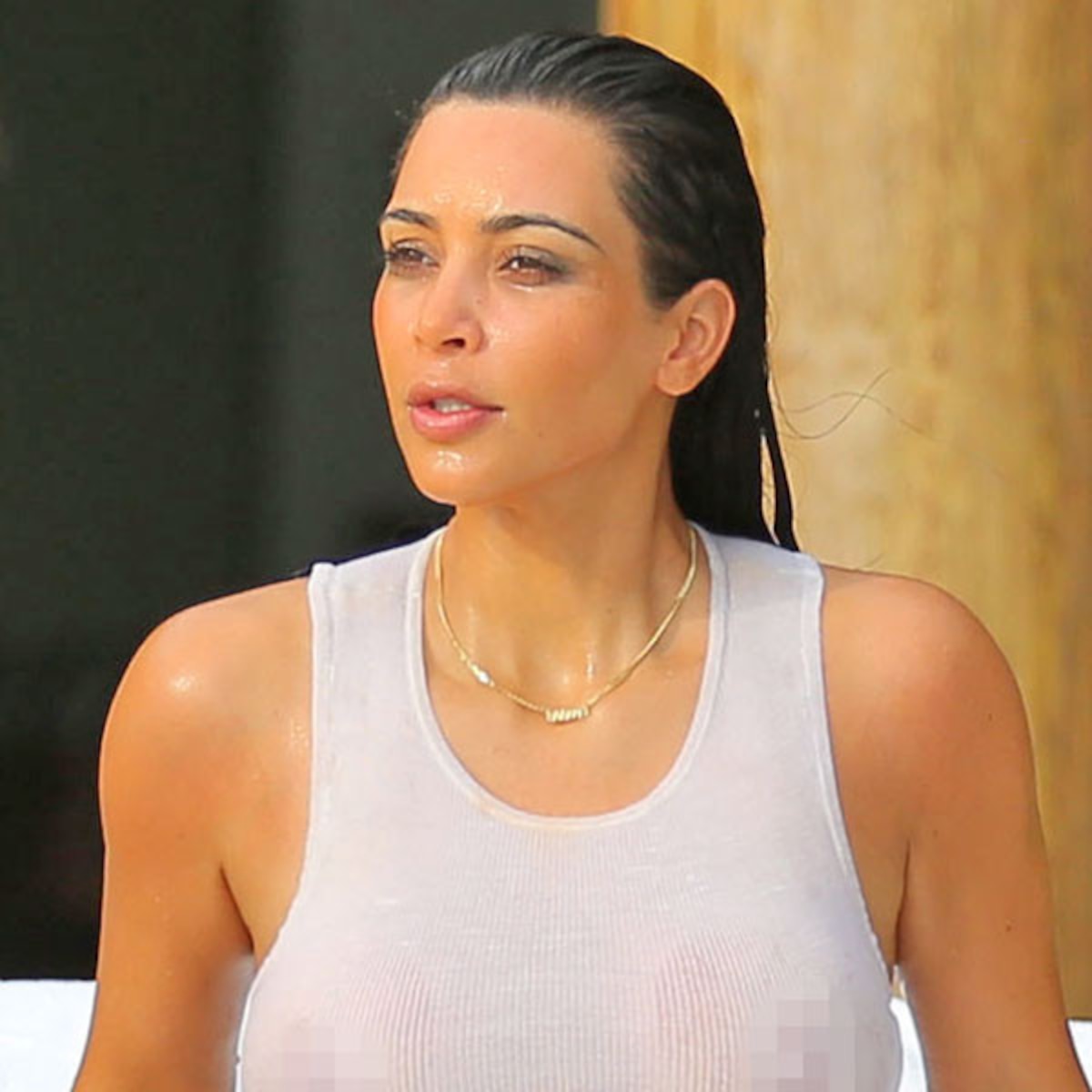 Kim Kardashian Bares Nipples in Wet White Tank-Top