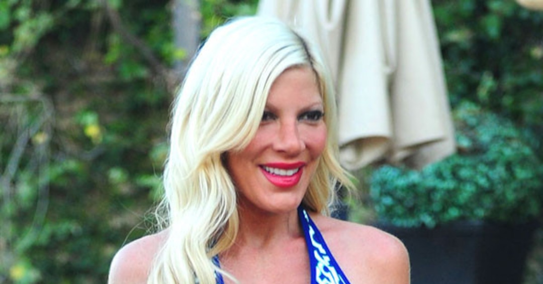 Tori Flaunts Major Cleavage During Bikini Shoot - E! Online