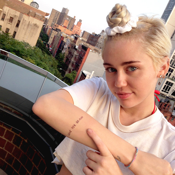 Exclusive All The Details And Pics Of Mileys New Tattoos E Online Uk