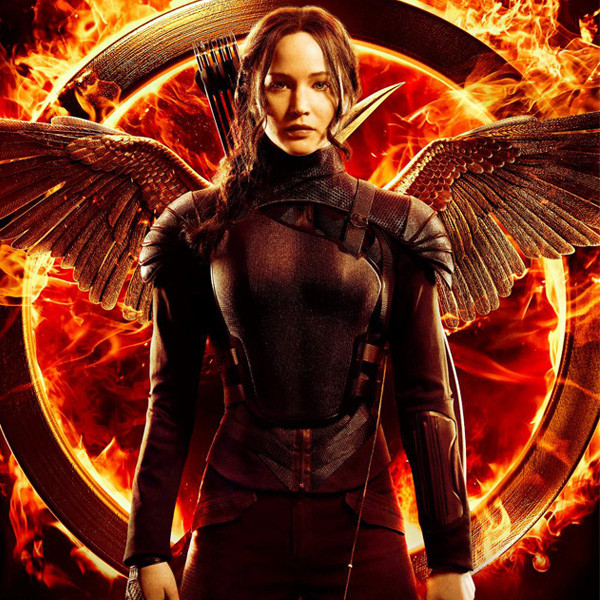 See Jennifer Lawrences Fiery New Mockingjay Movie Poster E Online