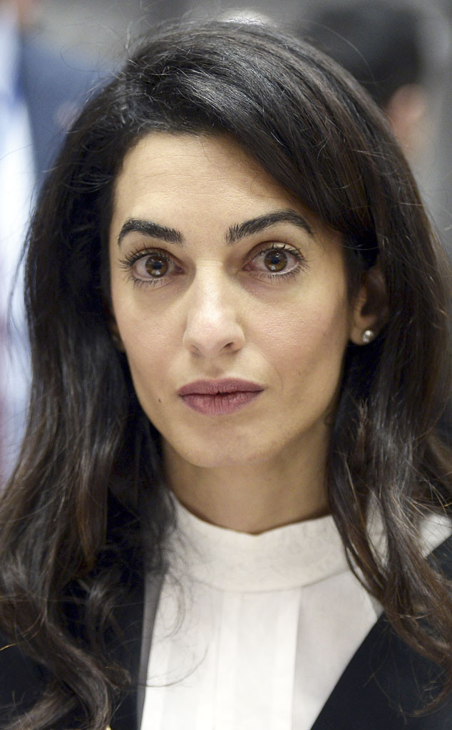 Amal Clooney Heads to Egypt to Help Free a Canadian Journalist | E! News